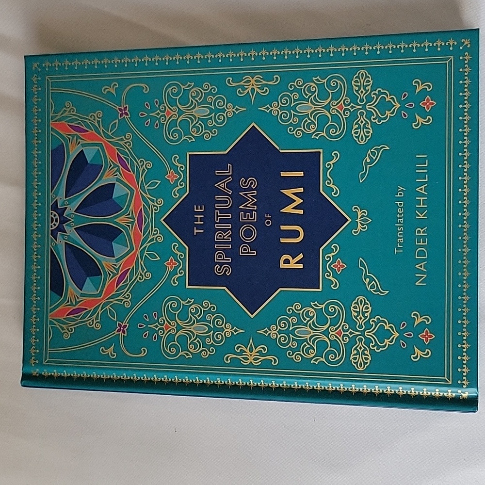 Elegant Teal Hardcover of Rumi's Spiritual Poems